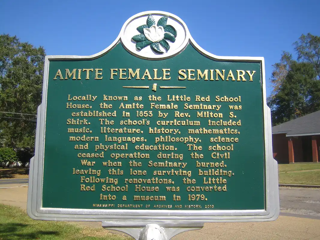 This marker for Amite Female Seminary in front of the Little Red Schoolhouse on Clinic St. across from the library in Liberty.