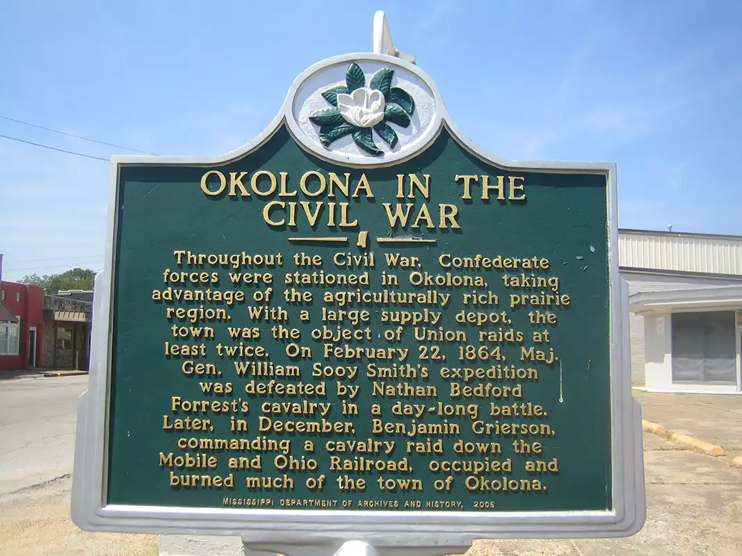 This marker for Okolona in the Civil War is at the corner of W. Main St. and N. Gatlin St. in downtown Okolona.