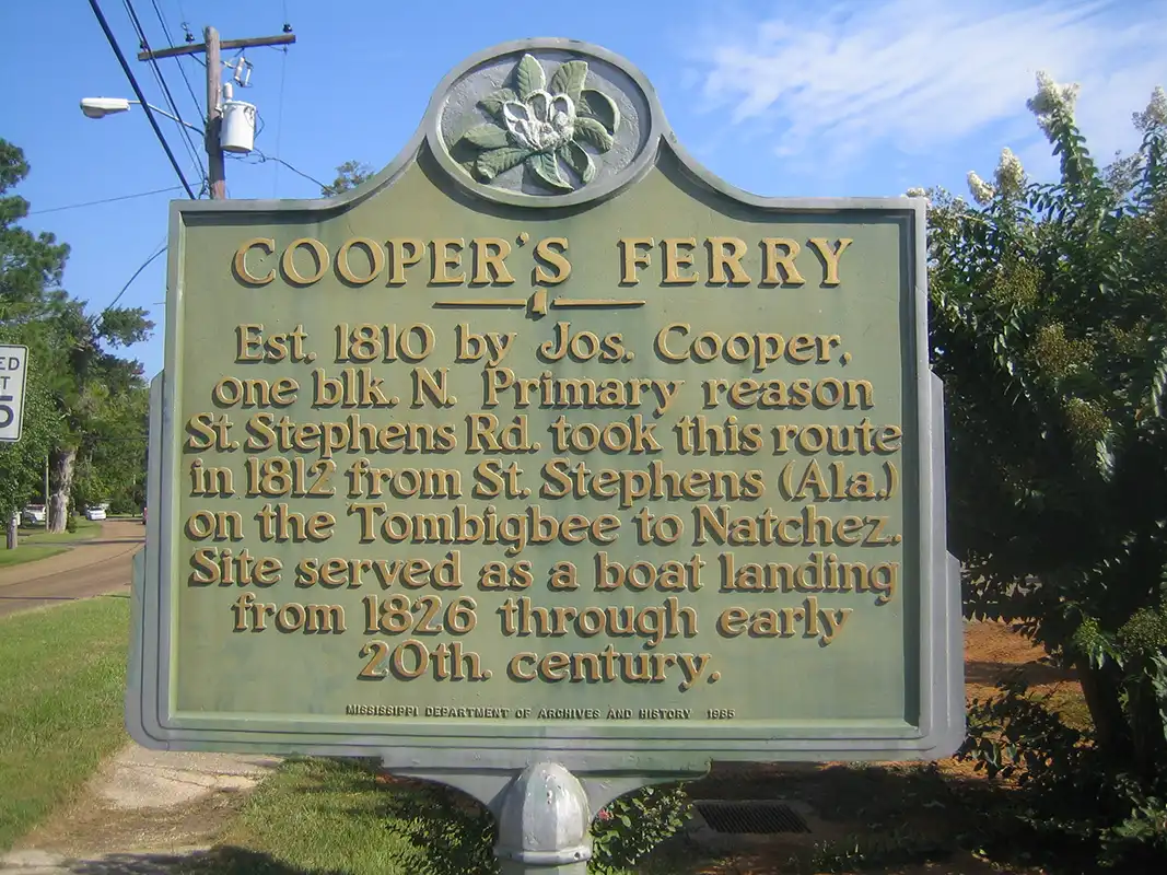 This marker for Cooper's Ferry is in a park behind the civic center (which looks like a courthouse) in Monticello.