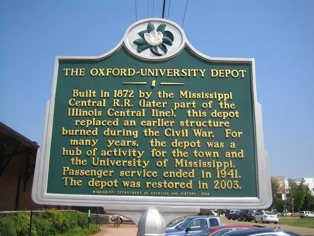 The Oxford-University Depot is at the end of Van Buren Avenue behind the Ford Performing Arts Center.