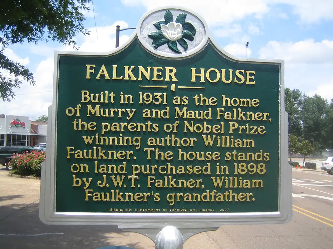 The Falkner House is on S. Lamar near its intersection with University Avenue.