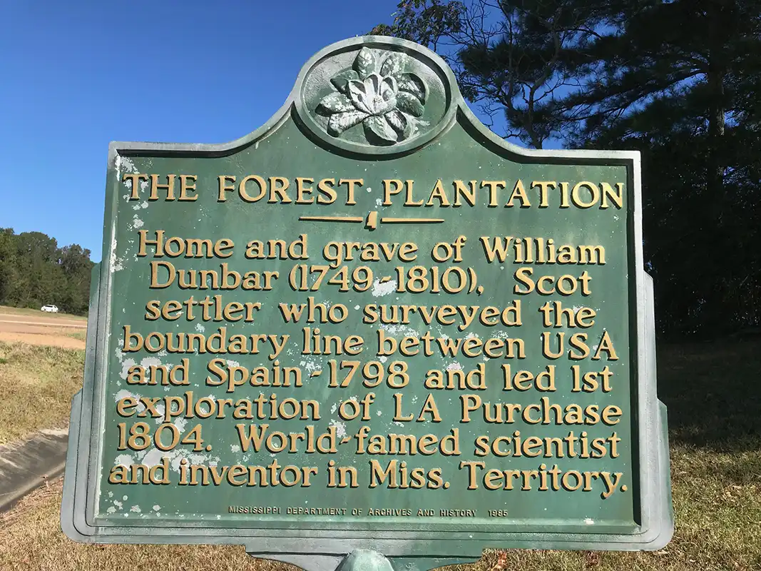 This marker for the Forest Plantation is about 5 miles south of Natchez on Highway 61.