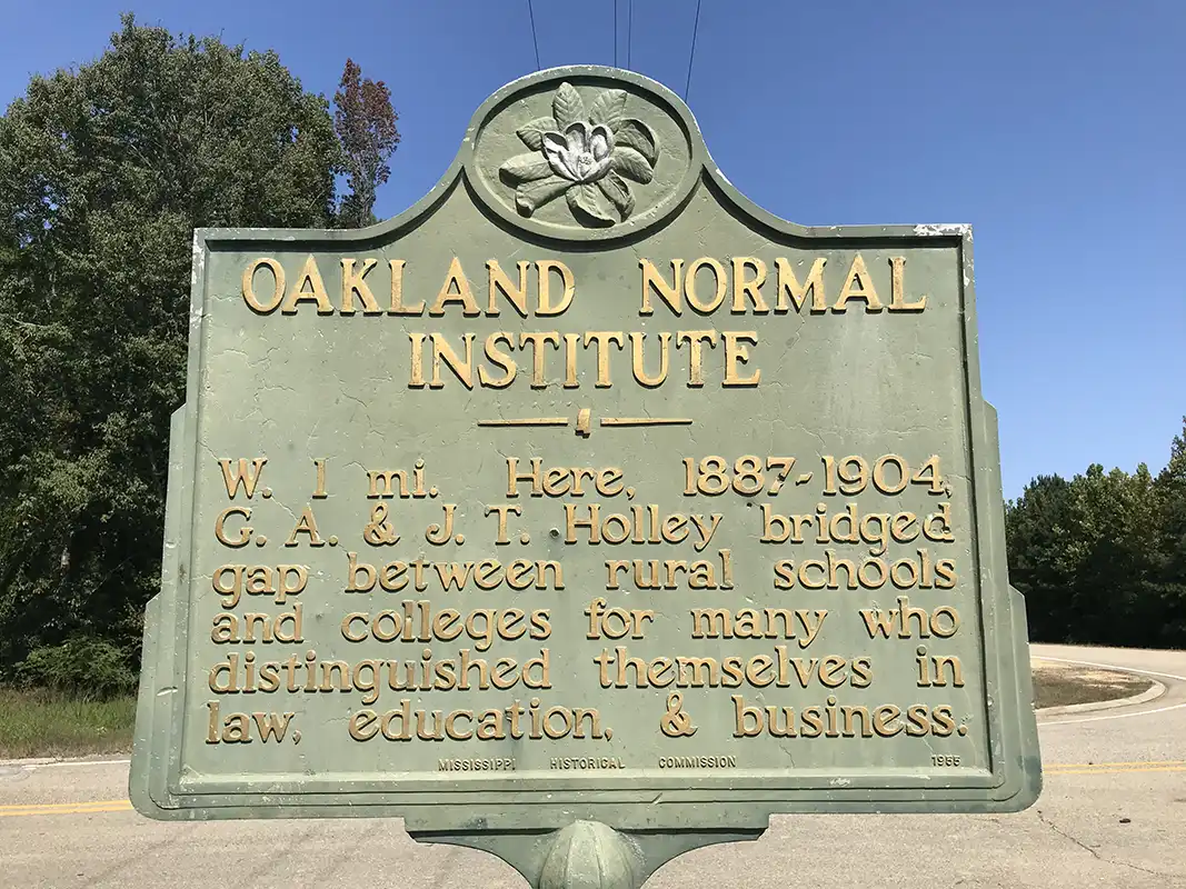 This marker for the Oakland Normal Institute is north of Tremont on Highway 23.