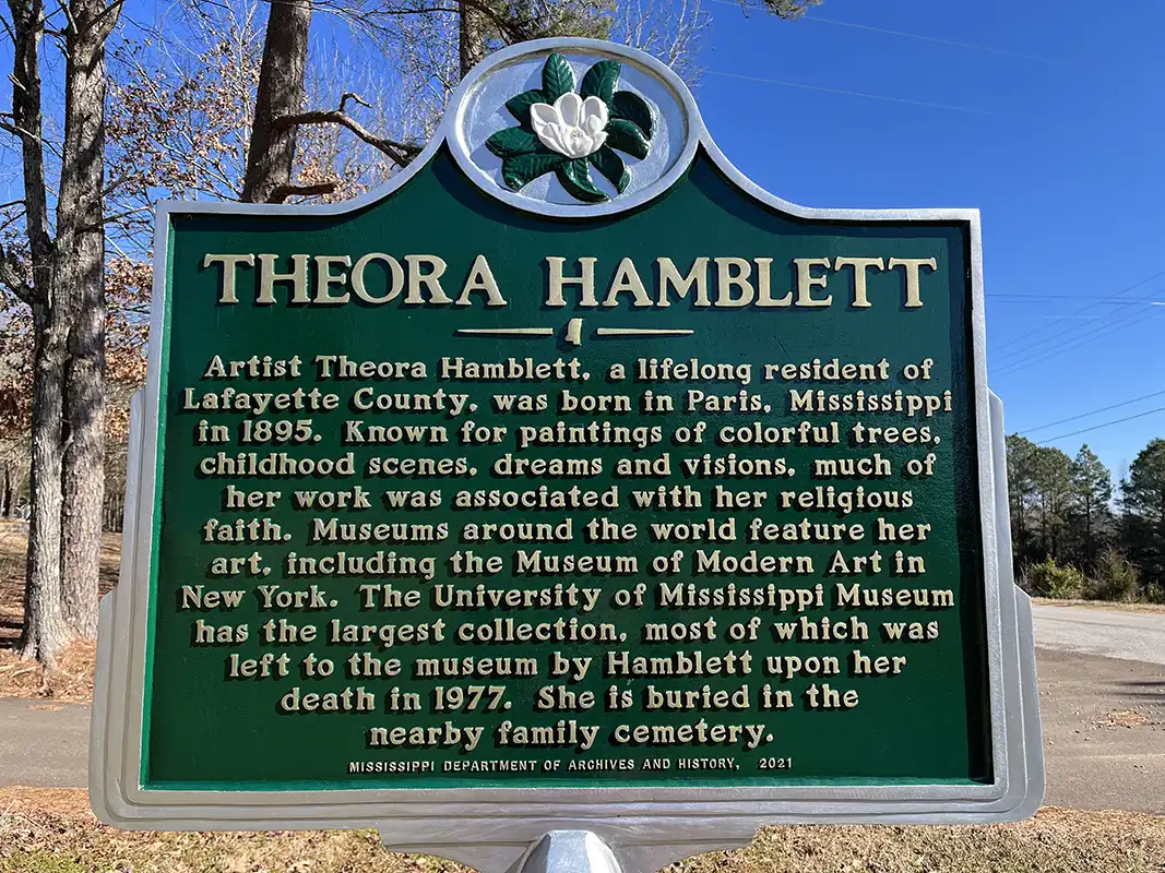 Theora Hamblett marker is at the intersection of Highway 315 and CR3017 in Paris.