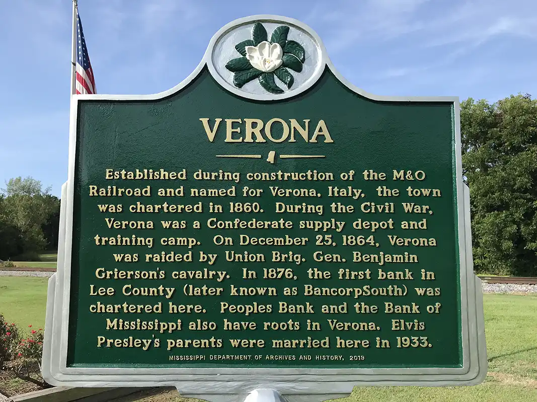 This marker is in Billy Fred Wheeler Park at the corner of Johnson Ave. and Main St. in Verona.
