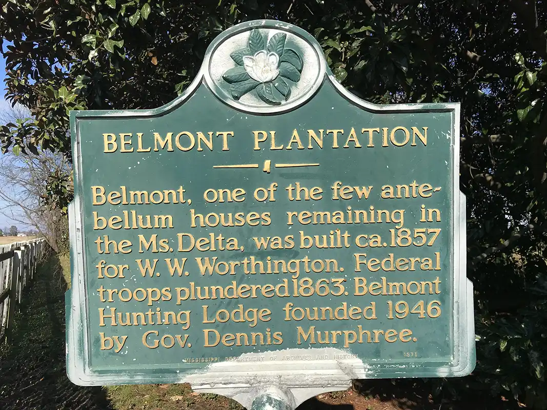The Belmont Plantation marker is under a large magnolia tree on Highway 1 at Wayside. Plantation is on east side of highway. Belmont is one of the few antebellum mansions in the Mississippi Delta to escape burning by Union Forces during the Civil War.