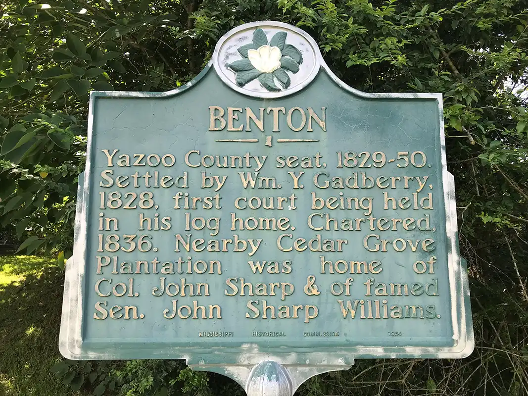 This marker is on Highway 16 in front of the post office in Benton.