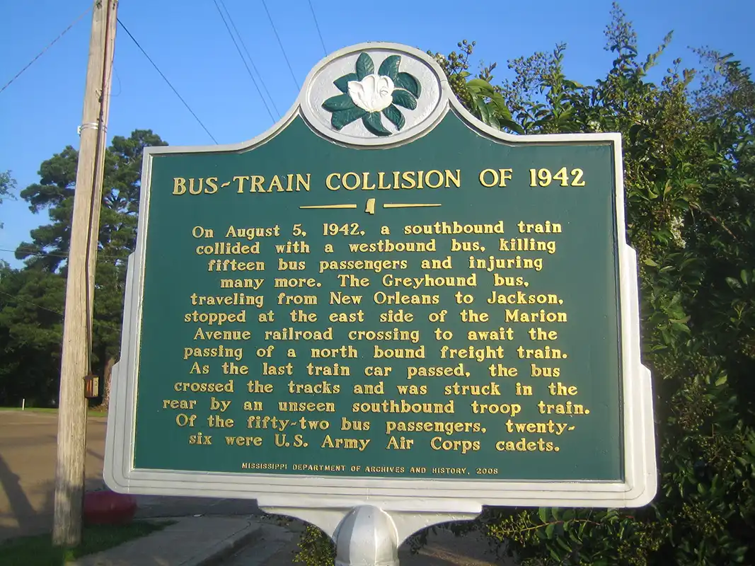 This marker, Bus Train Collision of 1942, is by the train tracks in Crystal Springs, a block from the city marker.