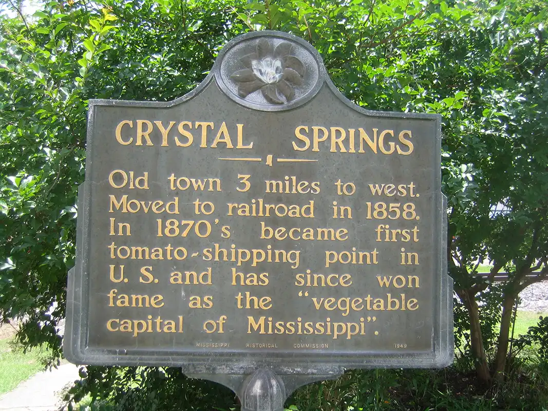 This marker is by the train tracks in downtown Crystal Springs.
