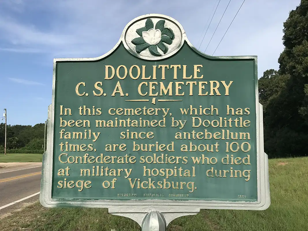 The Doolittle C. S. A. Cemetery marker is in Newton on Hwy 80, almost two miles west of the intersection of Hwys 80 and 15.
