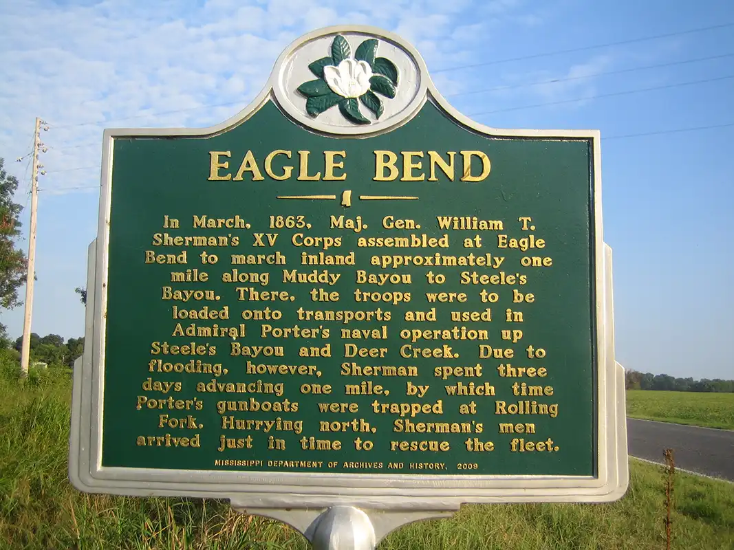 Go west on Hwy 465 (from Hwy 61) to Eagle Lake, but don't turn left at the "Y" at Eagle Lake; stay right on Hwy 465. In about a mile you will cross the small Muddy Bayou bridge, and the Eagle Bend marker will be just across the bridge on your left. Eagle Bend marker is at intersection of Hwy 465 and Muddy Bayou Road.