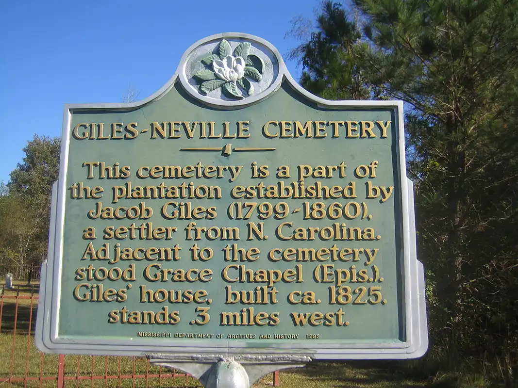 The Giles-Neville Cemetery marker is on Highway 16 where it meets Giles Road, about 2 miles before the Alabama border, and about 4 miles from the Hwy 45 intersection in Scooba.