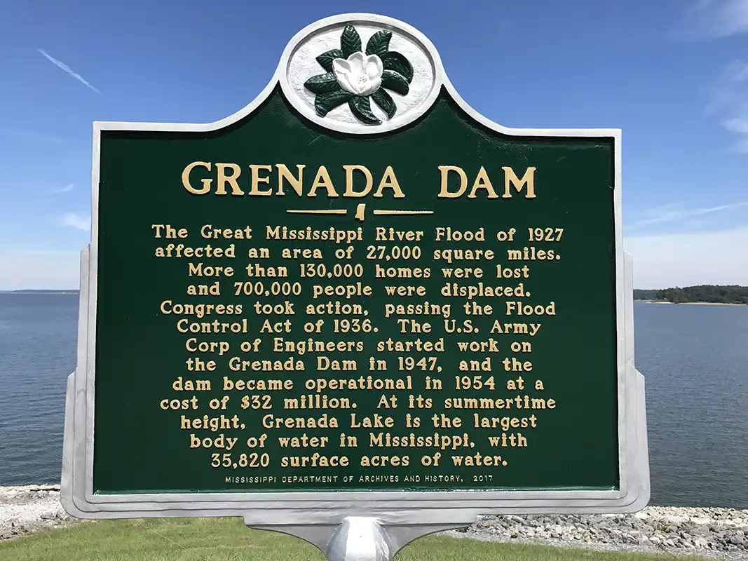 The Grenada Dam marker is on Scenic Loop 333 just past the Visitors Center at Grenada Lake.