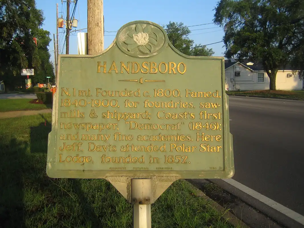 This marker for Handsboro is on E. Pass Road in front of the Masonic Lodge.