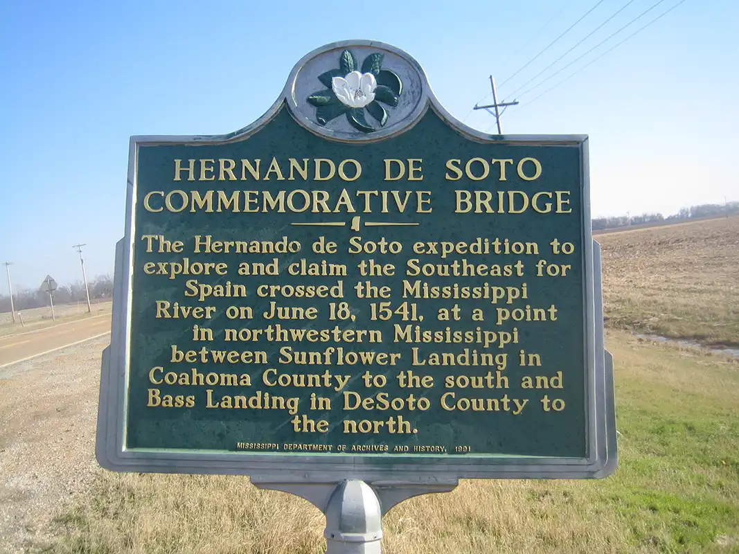 The Hernando De Soto Commemorative Bridge marker is on Highway 49 at the intersection with Highway 1 about 2 miles east of the bridge to West Helena, Arkansas.