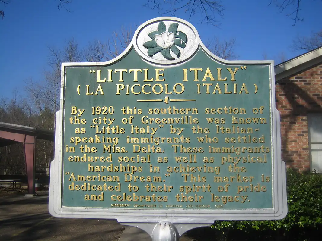 The Little Italy (La Piccolo Italia) marker is on Italian Club Road, about 100 yards west of S. Main Street in Greenville.