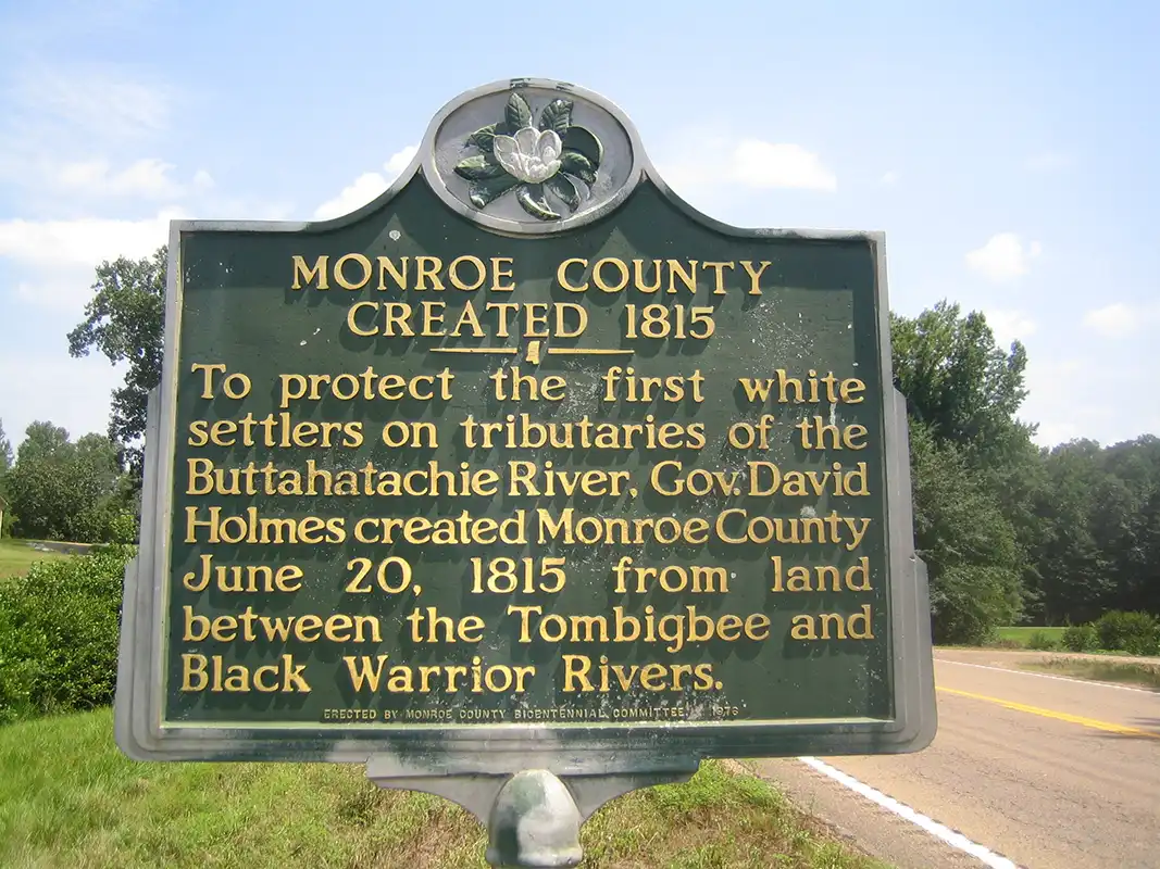 This Monroe County marker is on Highway 278 west of Gattman, about one mile east of the intersection with Highway 8.