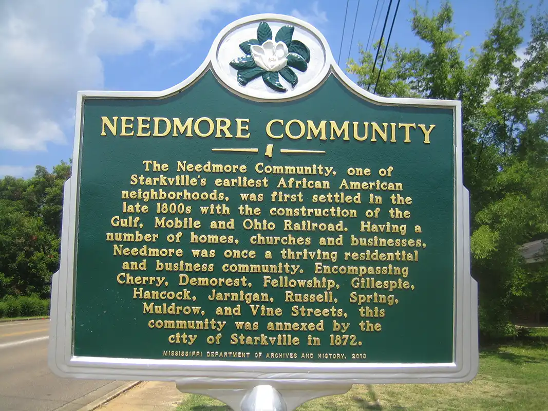 Charles "LaLa" Evans, a native of the Needmore Community, spearheaded the effort to erect this marker in 2013.