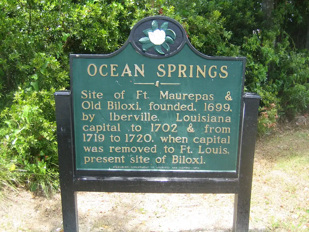 This marker for Ocean Springs is in a park by the Gulf.