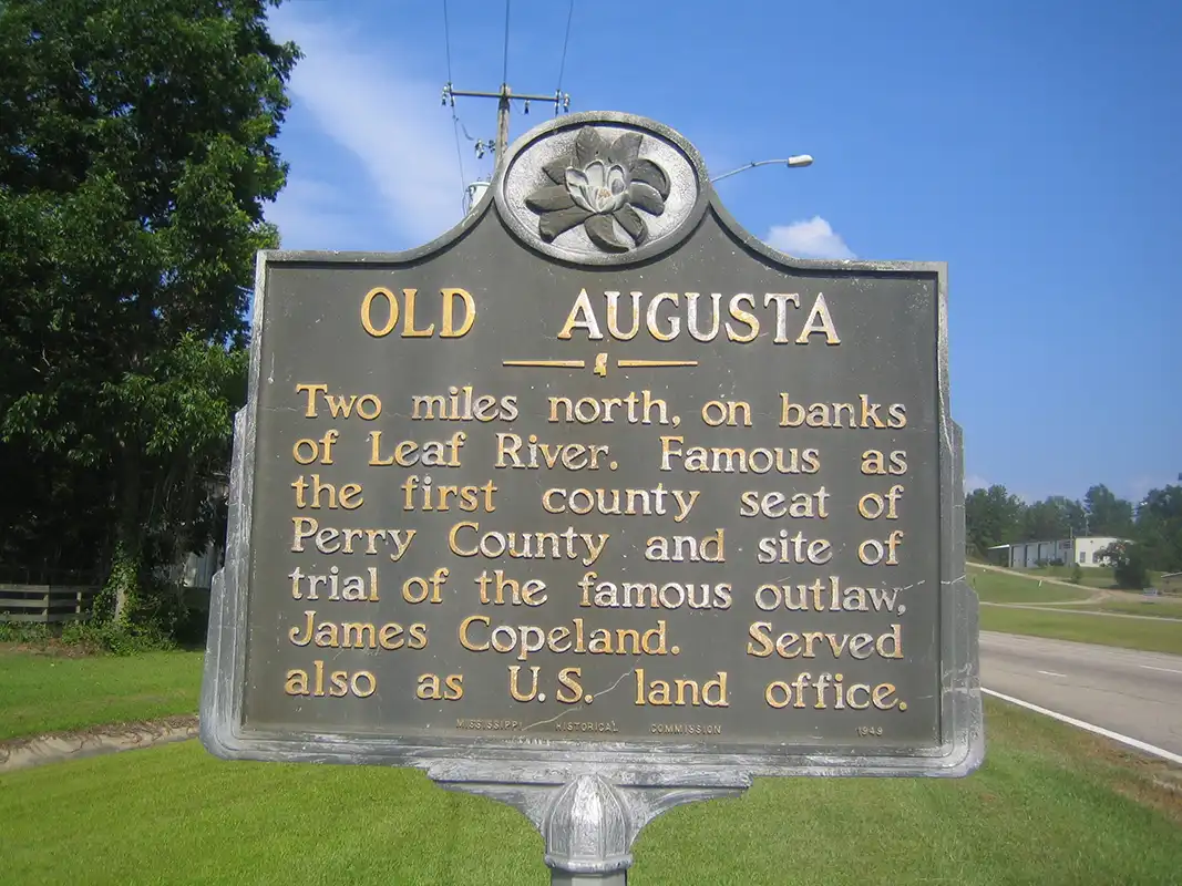 The Old Augusta marker is in New Augusta at the corner of Highway 98 and Main Street. This is the only marker in Perry County (but there are LOTS of pine trees).