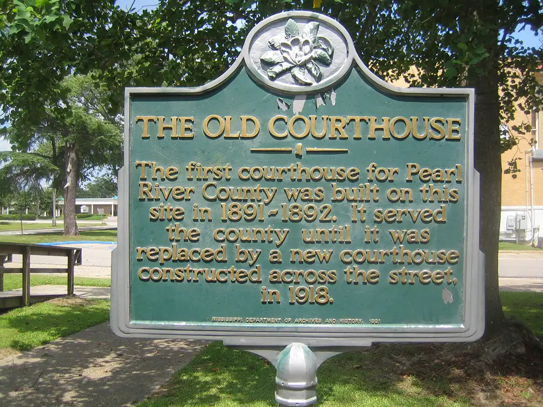 This marker, The Old Courthouse, is on S. Julia Street behind the courthouse in Poplarville.