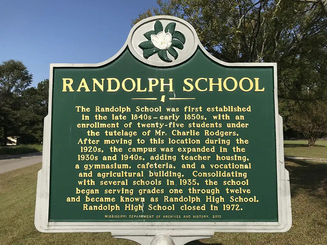 This marker is in the community of Randolph on the Randolph Loop off Highway 9. It is in front of the Randolph Community Center. Elvis and Johnny Cash once sang at this school in 1955.
