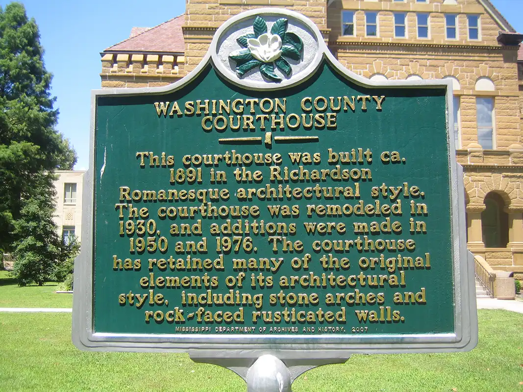 The Washington County Courthouse marker is located at 900 Washington Avenue on the grounds of the courthouse in Greenville.