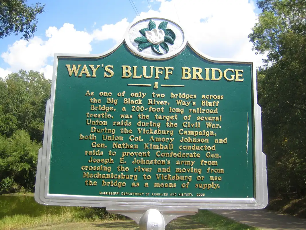 This marker for Way's Bluff Bridge is at the entrance to the Duncan Gray Conference Center north of Canton about a mile west of Highway 51. Address is 1530 Way Road.