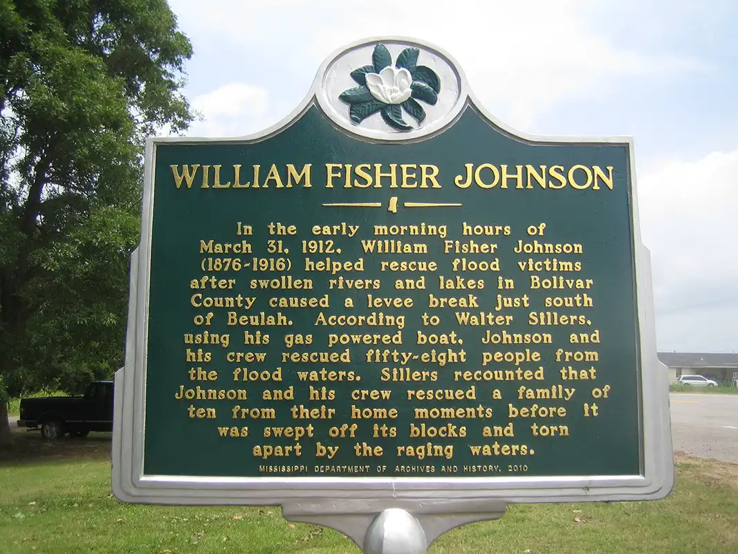 The William Fisher Johnson marker is on Highway 1 between Benoit and Scott near a boat ramp that looks like a roadside park.