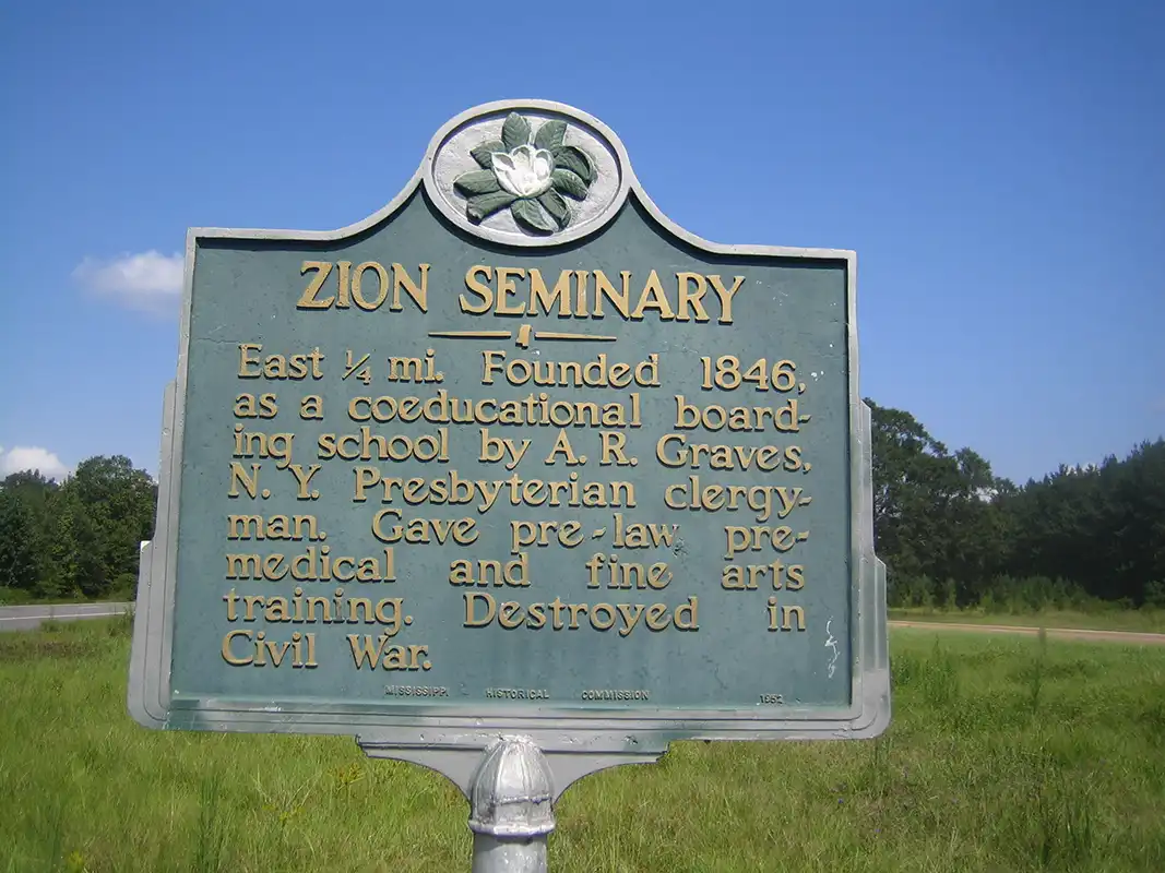 The Zion Seminary marker is on Highway 49 at the intersection with Highway 590. The marker is in the median.