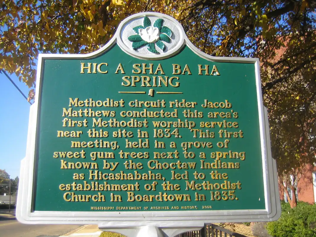 This marker for Hic a Sha Ba Ha Spring is at the First United Methodist Church in downtown Starkville.